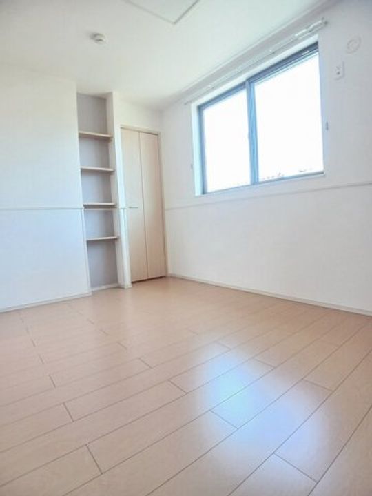 エム・シャルム善通寺Ⅲ0205の居間