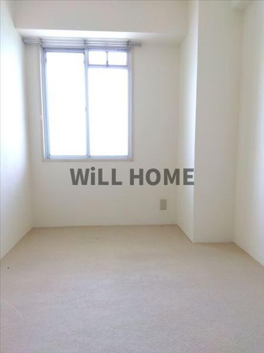 サンライズマンション岩出V壱番館の居間