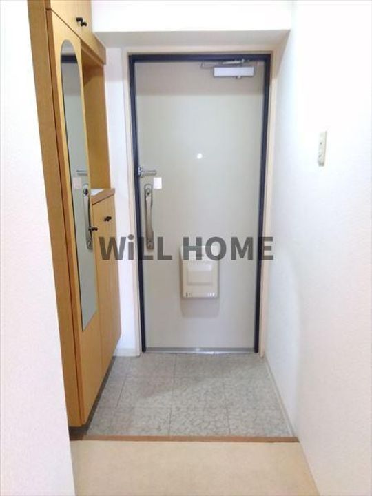 サンライズマンション岩出V壱番館の玄関