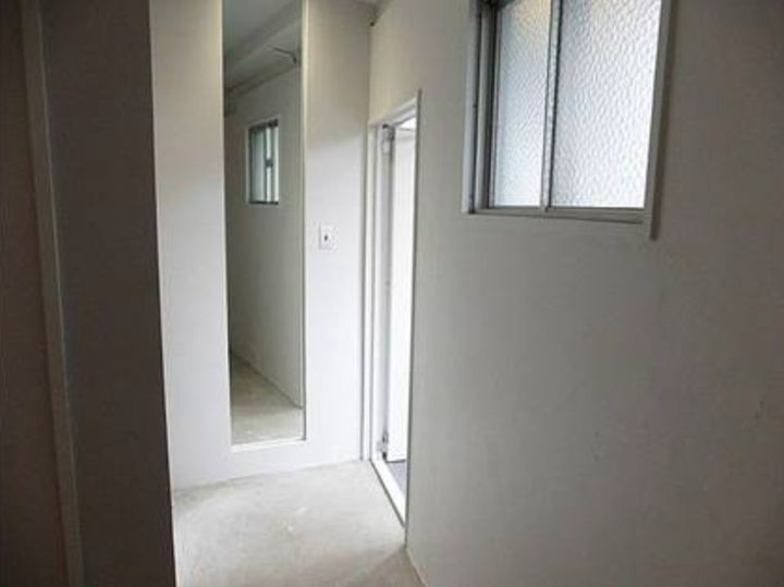 レジデンシャルパーク久留米駅前207号の玄関