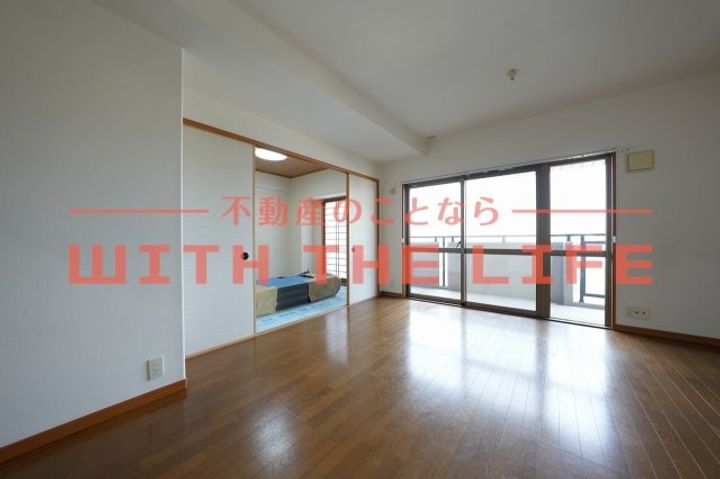 サーパス諏訪野第2905号の居間