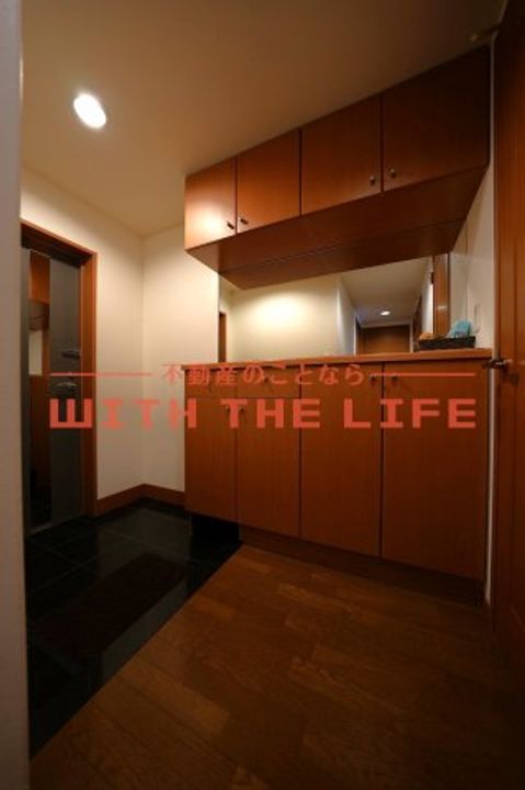 サーパス諏訪野第2905号の玄関