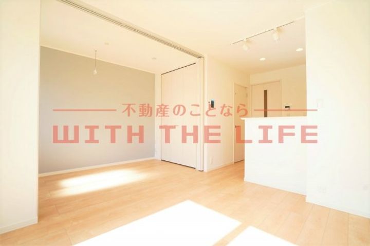 メゾンシュクレ103号の居間