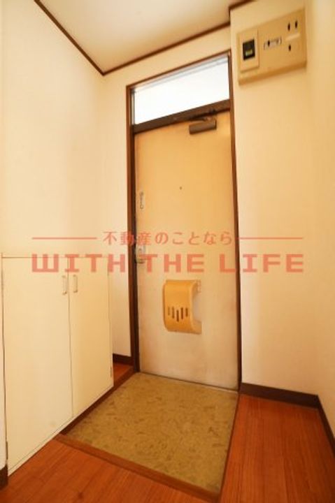 コスモハイツ柳瀬201号の玄関