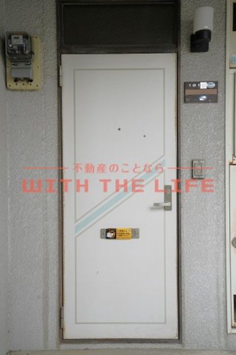 コスモハイツ柳瀬201号の玄関