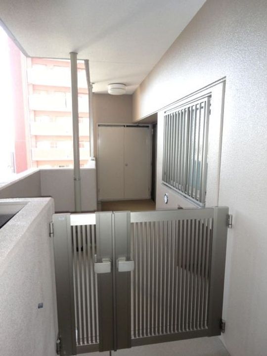 プレミアムステージ久留米中央公園1303号の玄関