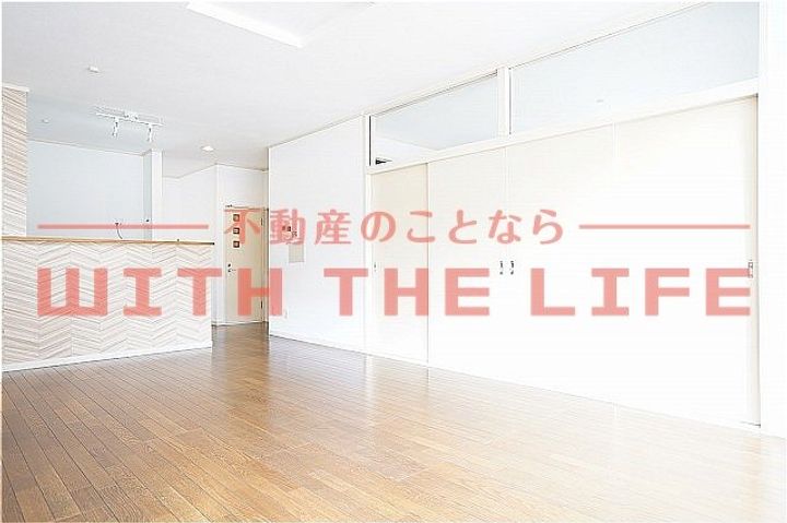 ピジョン・コートA号室の居間