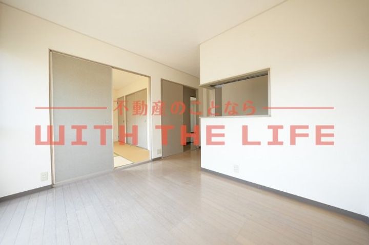 ハミングタウン合川B101号の居間