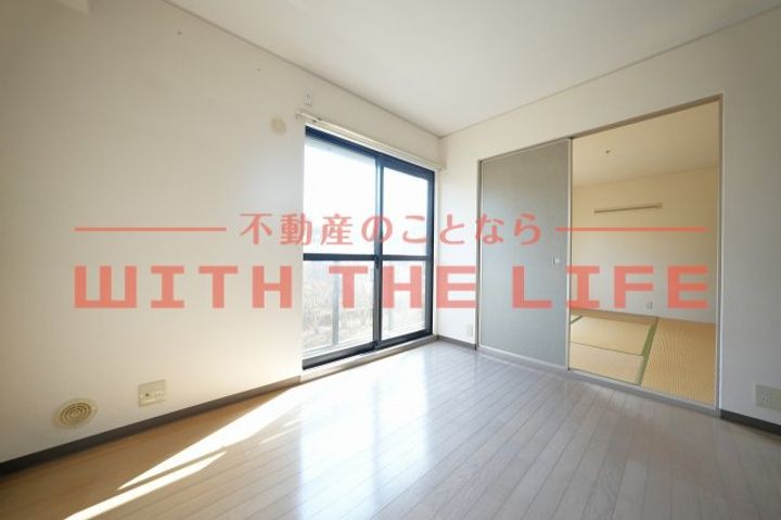 ハミングタウン合川B101号の居間