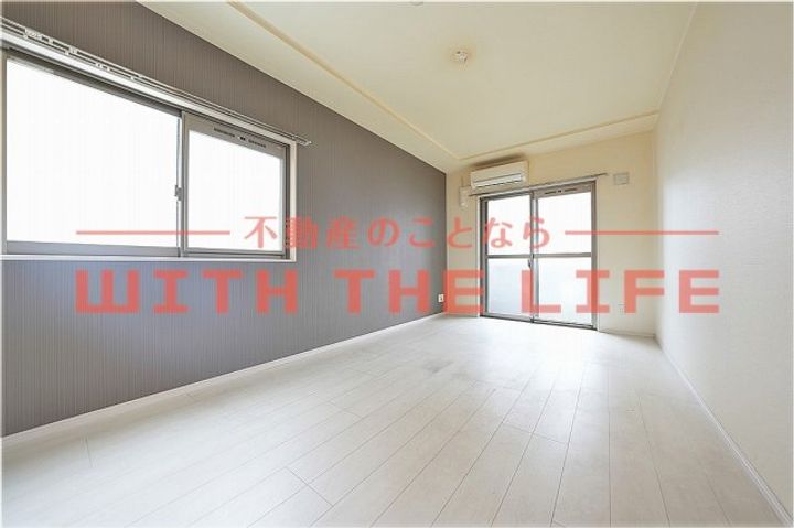 モアプラス西鉄久留米駅前203号の居間