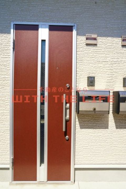 コンフォート205号の玄関