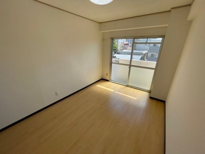 マンションにぎわいの寝室