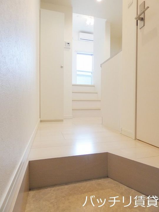 福岡県福岡市博多区堅粕4丁目の賃貸アパートの玄関