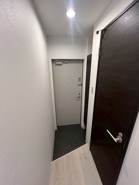 ジーメゾン垂水オアシエの玄関