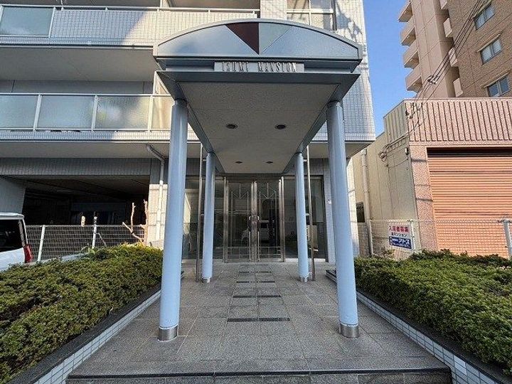泉マンションの玄関