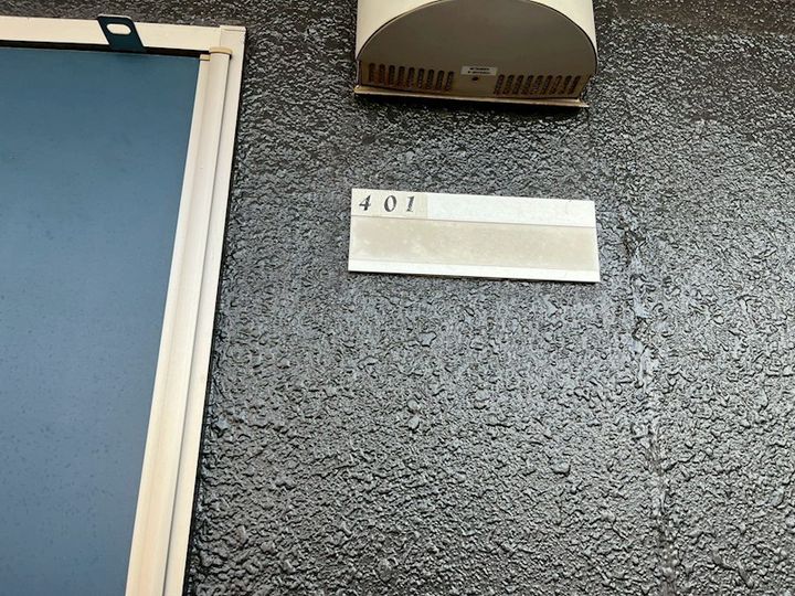 かねまつ庄内ビルの玄関