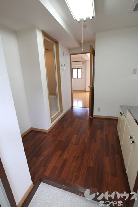 ハイツ島口402の居間