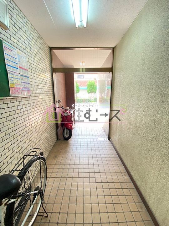 PALMIZIO平野西2の玄関