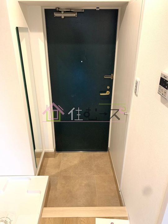 おおきに北梅田サニーアパートメントの玄関