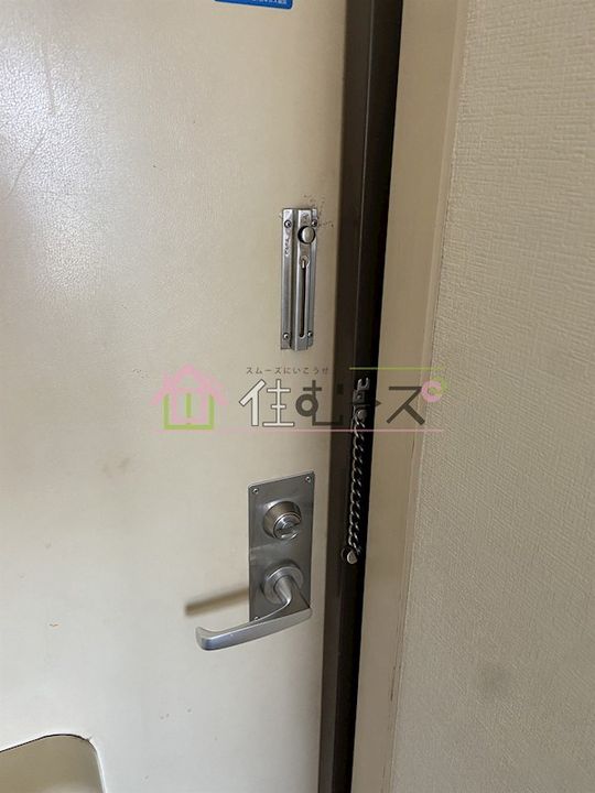 田川ロータリーハイツの玄関