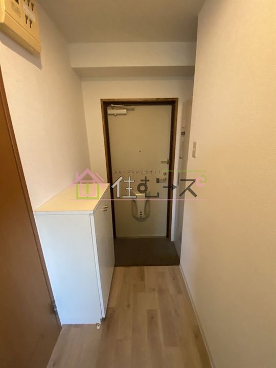 ドミール桜川の玄関