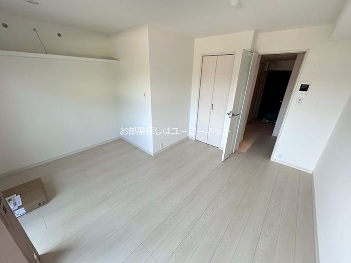 鹿児島県姶良市東餅田の賃貸マンションの居間