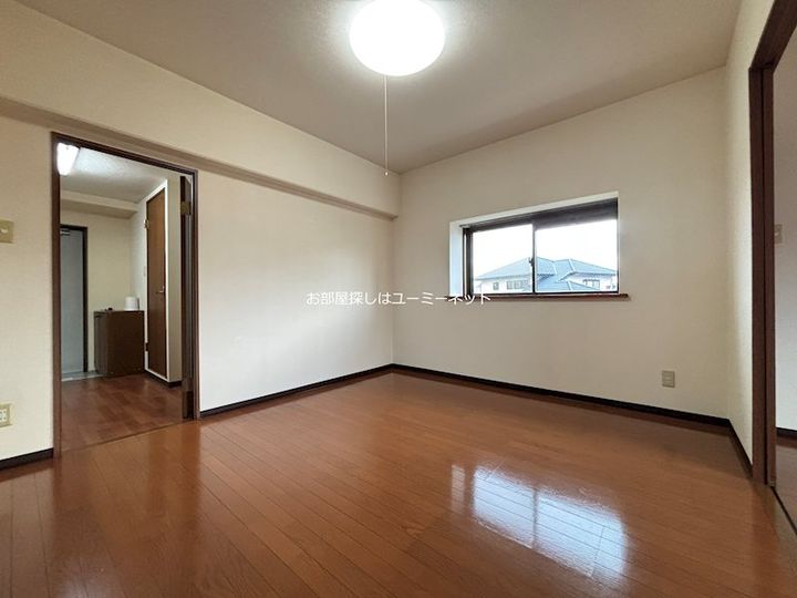 サザン姶良202の居間