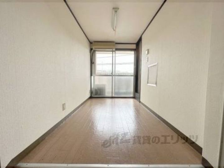 第1レジデンス春田122の寝室