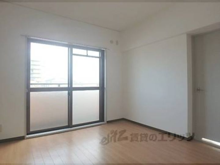 エクシード西大津302の寝室