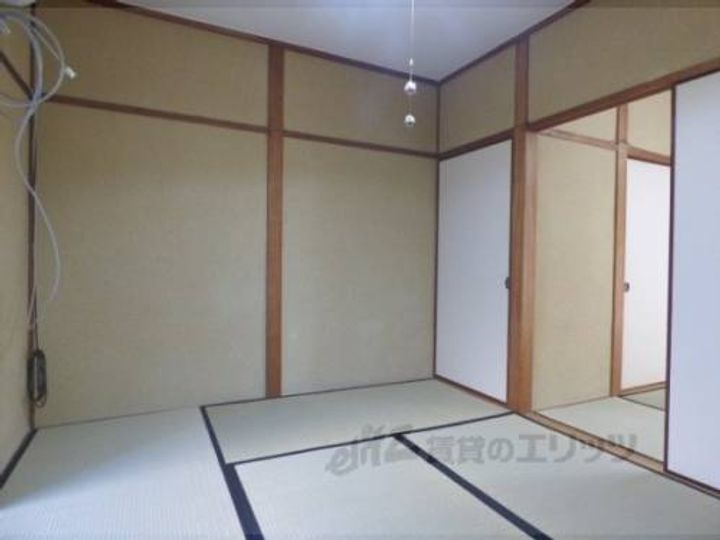 桂ノ宮荘1F02の寝室