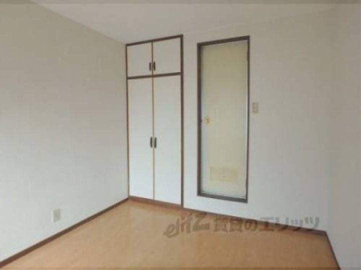 ハイツサンエー202の寝室