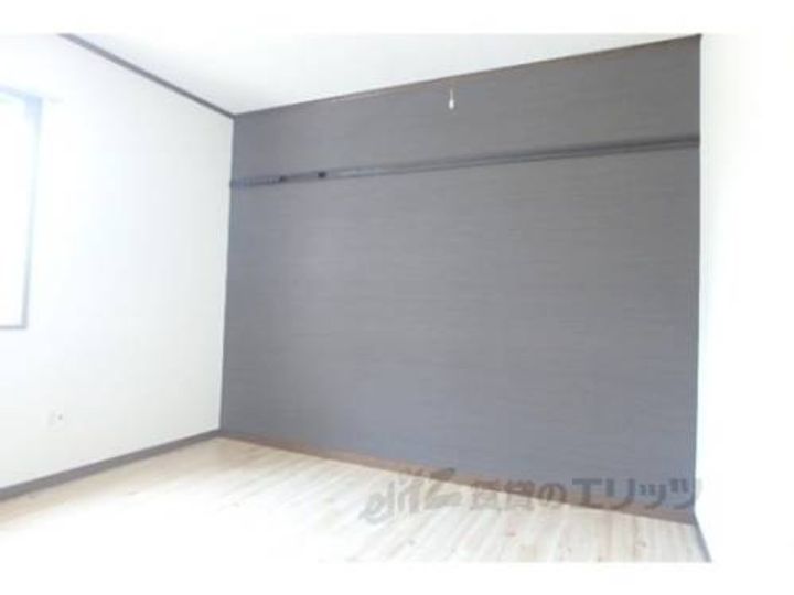 エステート守山A棟203の寝室