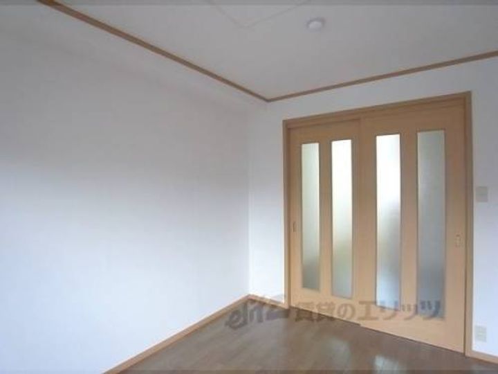 プラシードTSUKASAA棟101の寝室