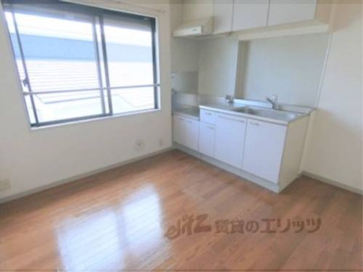 アメニティ21B棟202の玄関