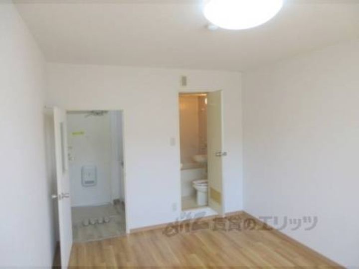 諏訪東生駒ビル306の寝室